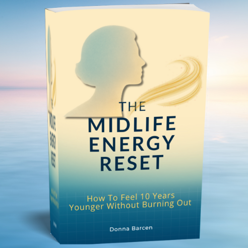 Book titled 'The Midlife Energy Reset' with a silhouette of a woman on a gradient cover.